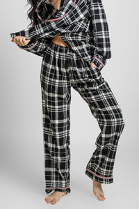 Black and white plaid hoodie pyjama suit for cozy comfort.