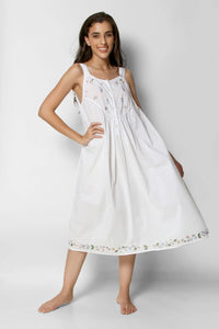 Elegant white nightdress with floral embroidery for comfortable sleepwear.