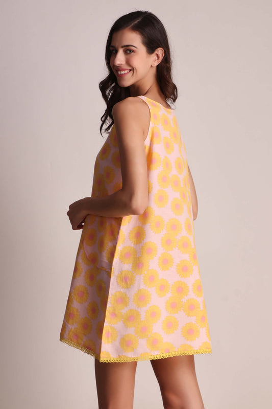 "Twiggy dress with floral print and playful design for summer fashion."