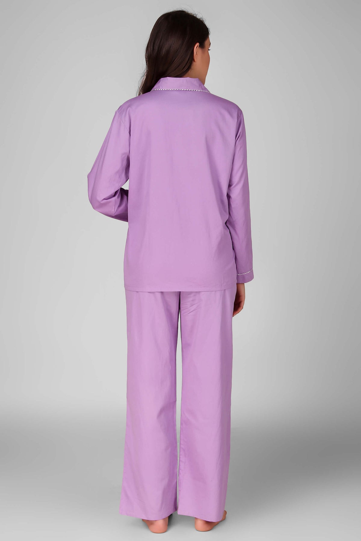 Purple Judith pyjama suit showcased from the back. Comfortable and stylish design.