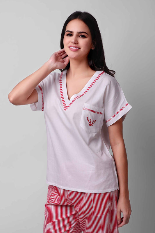 Candycane pajama set featuring red and white striped design.