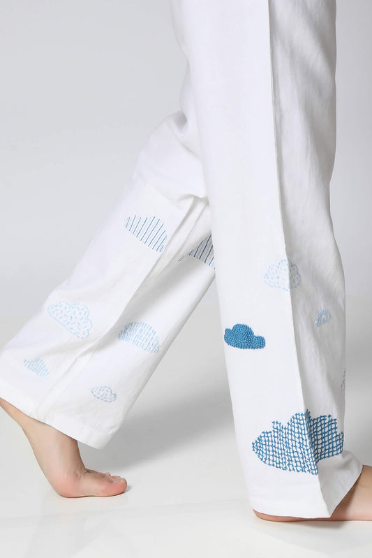 Limited edition white pyjamas with cute cloud designs.