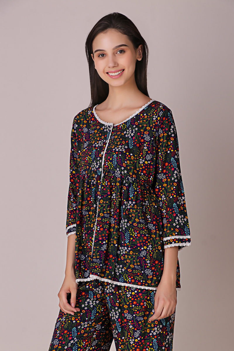 Colorful Reva Pyjama Suit featuring a floral design and comfortable fit.