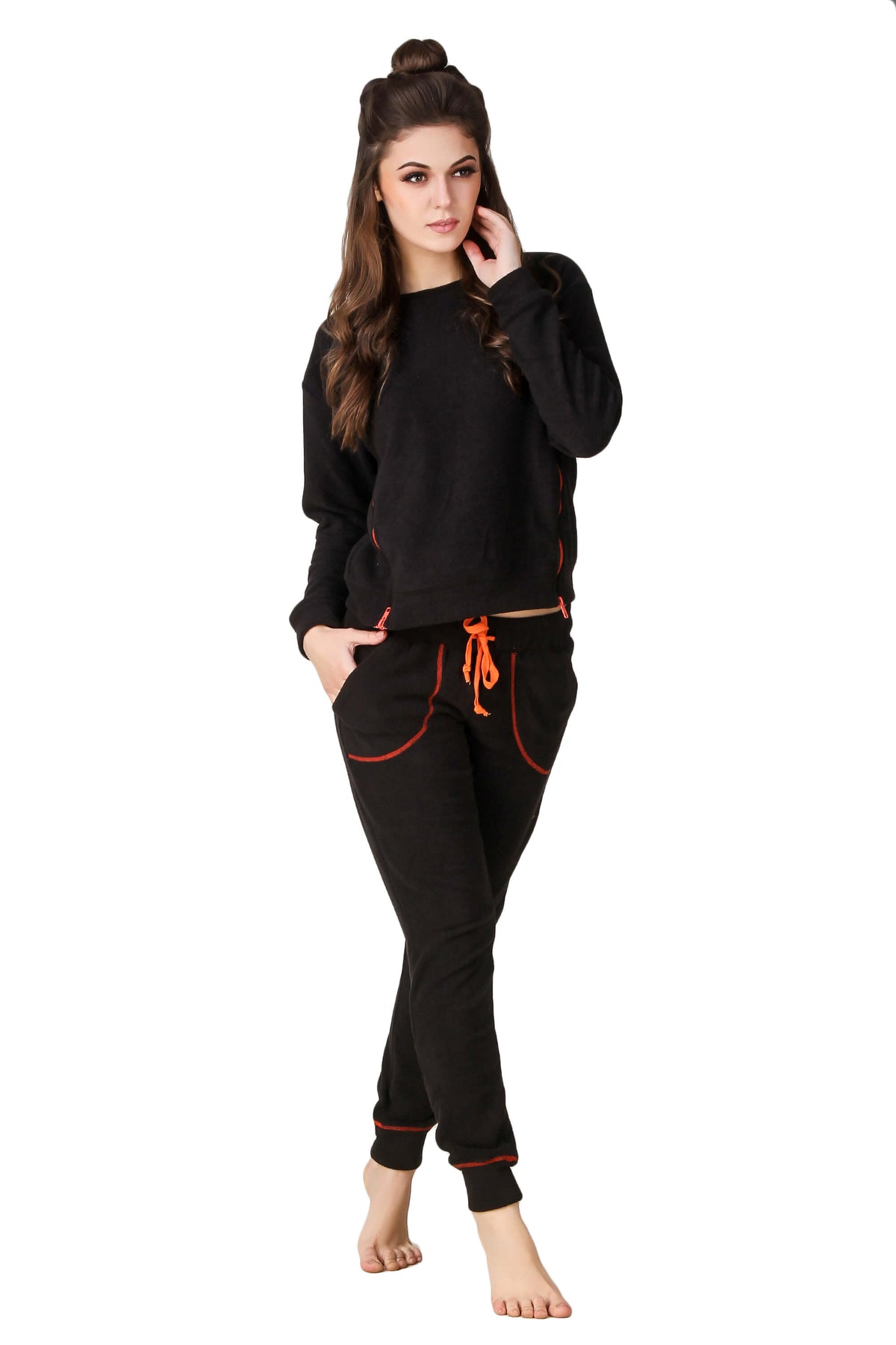 Stylish black pyjama suit with vibrant orange accents for women.