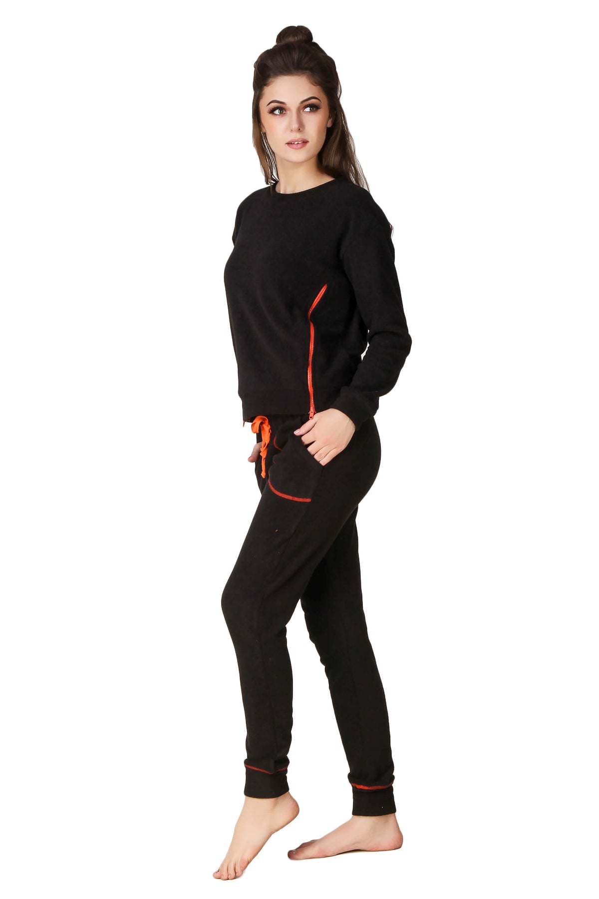 Stylish black Paula pyjama suit with contrasting orange details.