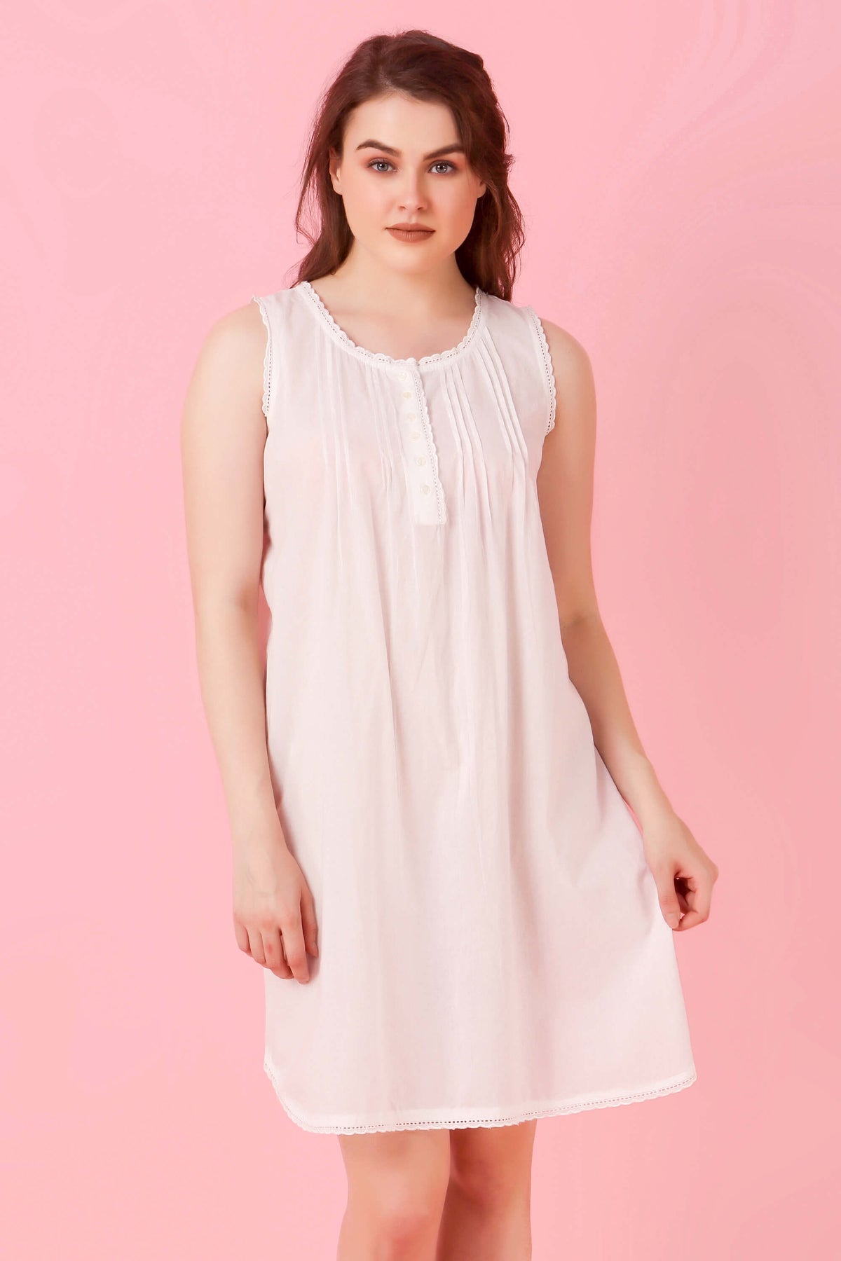 Soft sleeveless nightdress in light pink for comfortable sleep.