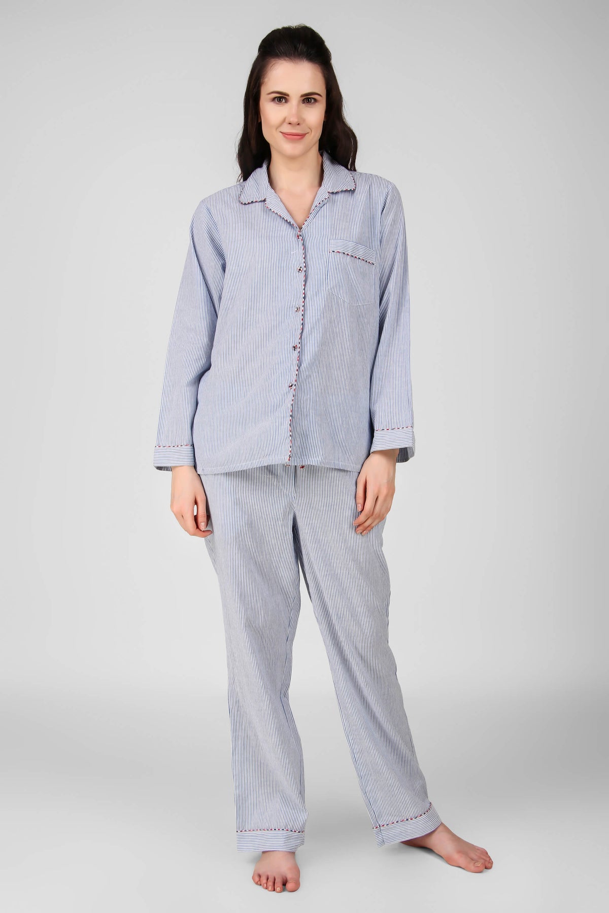 Max Women's Pyjama Suit in blue and white stripes, model standing.