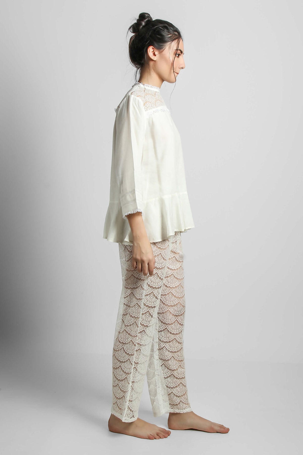 Georgina lace pyjama suit featuring shorts and a stylish top.