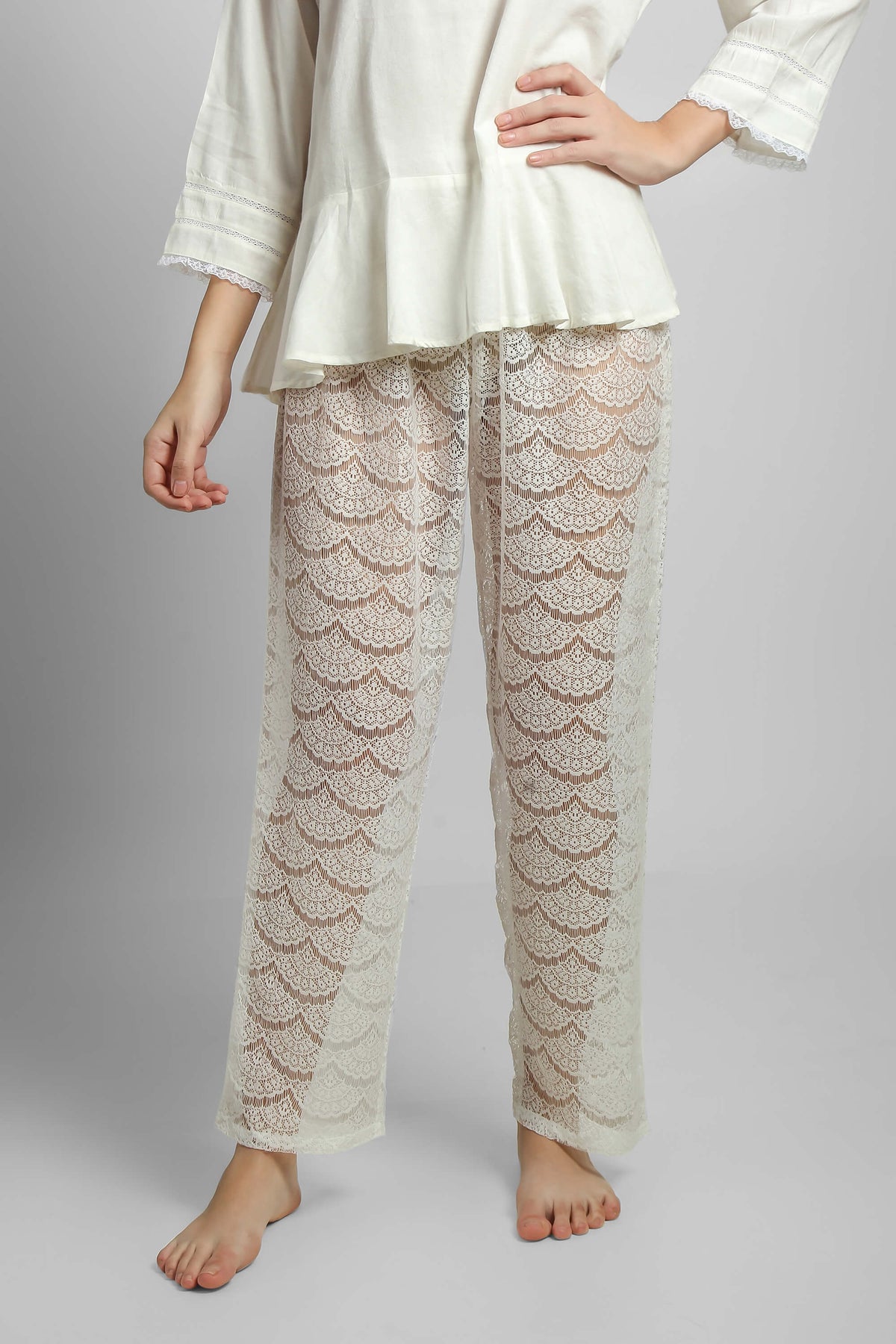 Georgina lace pyjama suit featuring stylish shorts and top.