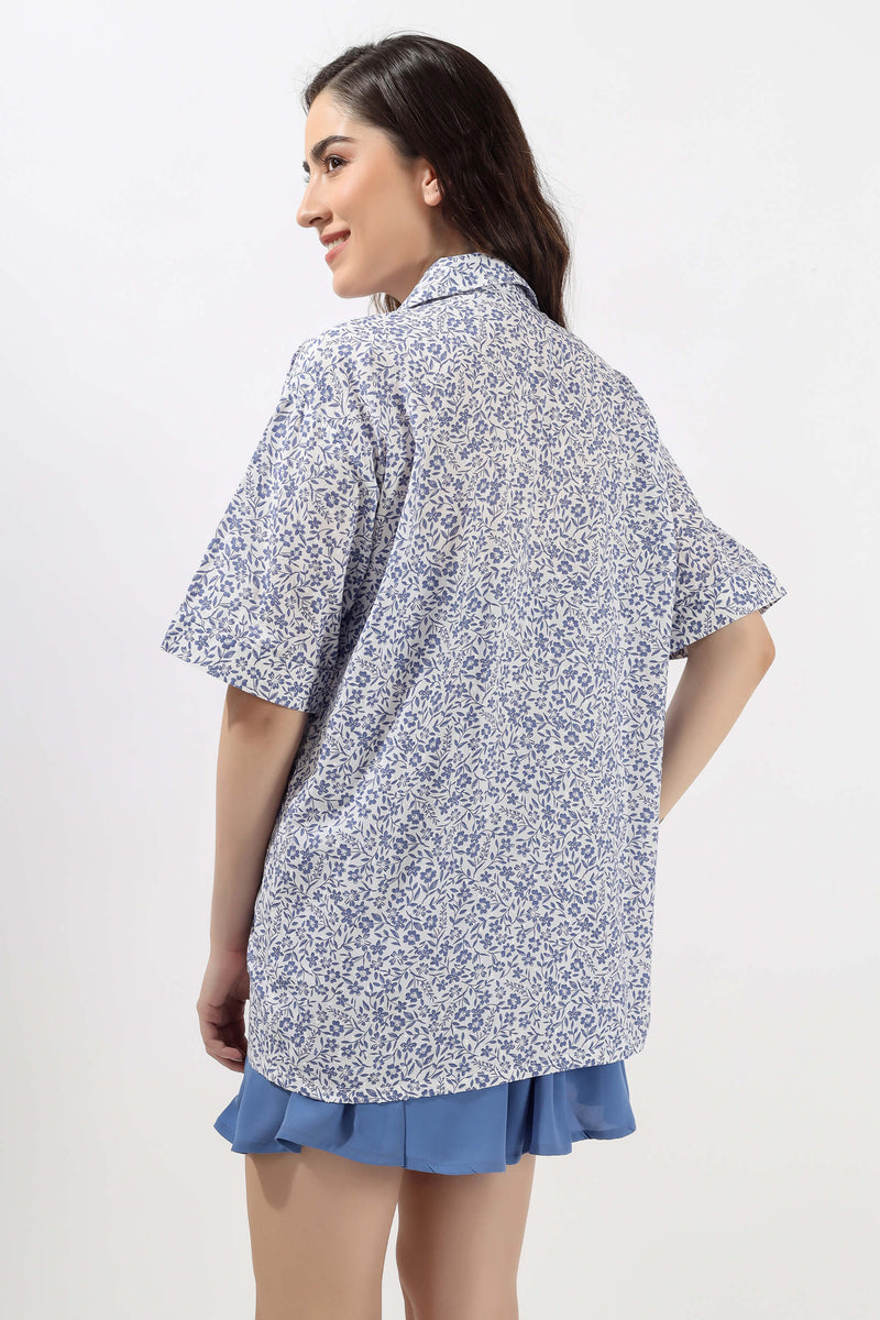 Reese Print Shorts Set featuring a stylish floral shirt and blue shorts.