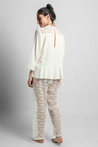 Georgina lace pyjama suit featuring stylish shorts and elegant top.