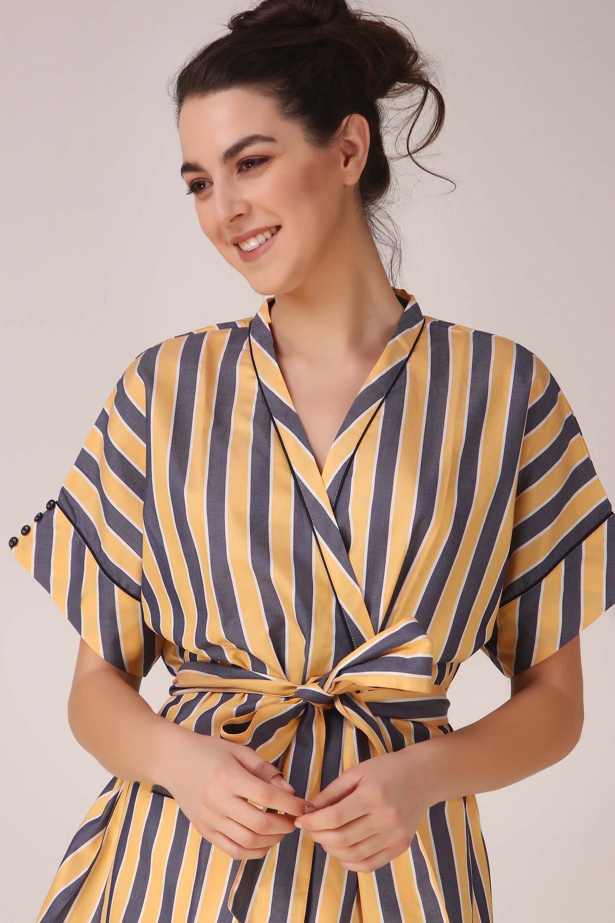 "Vivian Robe featuring stylish yellow and gray striped design."