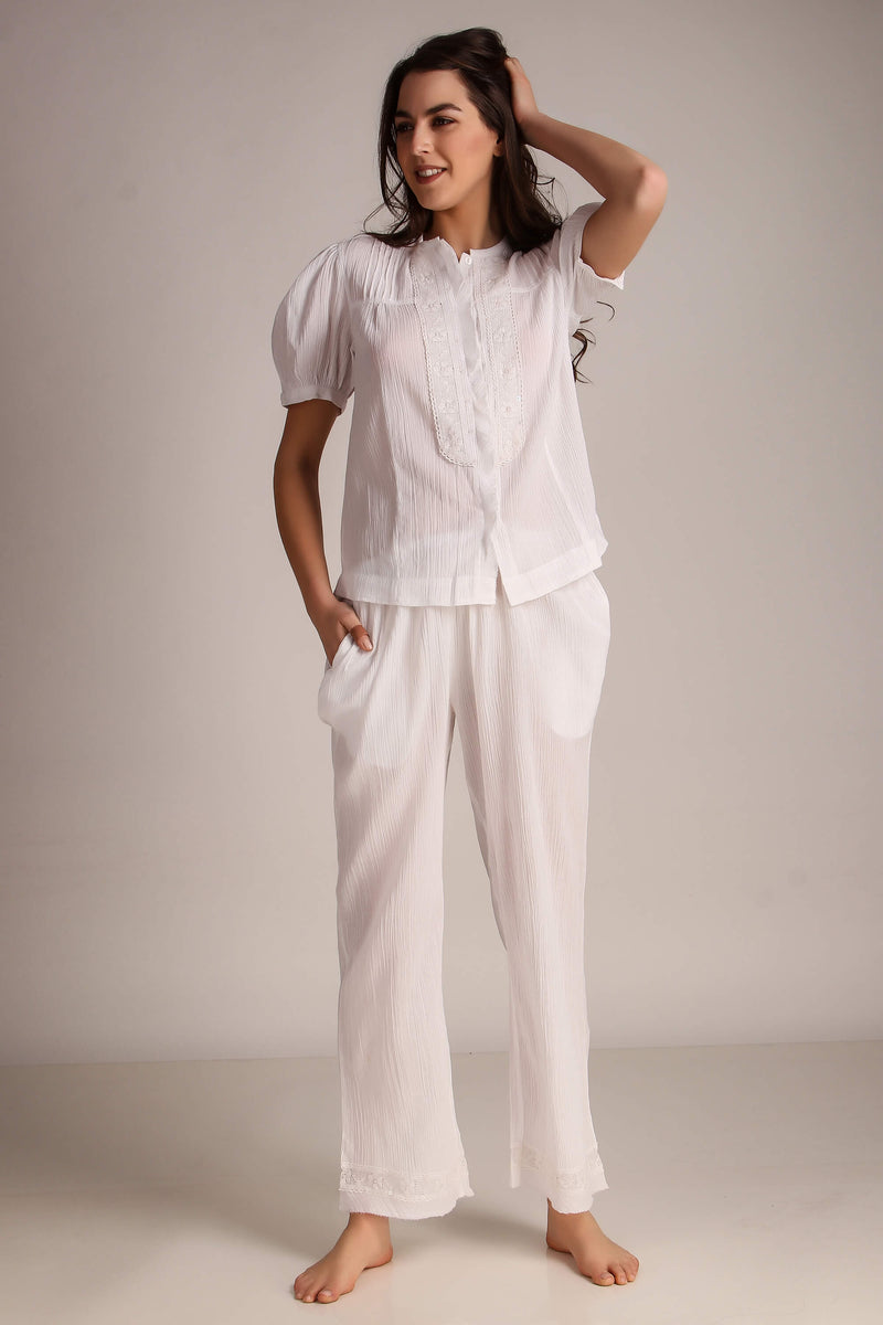 Cecilia pyjama suit in white, featuring a stylish, relaxed design.