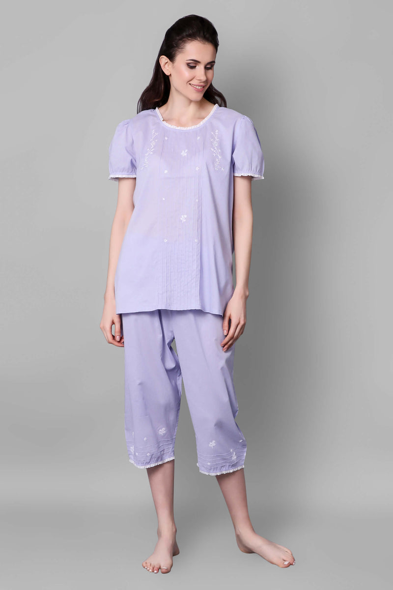 Lavender Sally pyjama suit with embroidered floral design for women.