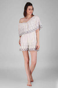 Elegant off-shoulder Joyce romper with floral embroidery design.
