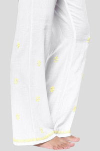 Misha Pyjama Suit in white fabric with yellow embroidery details.